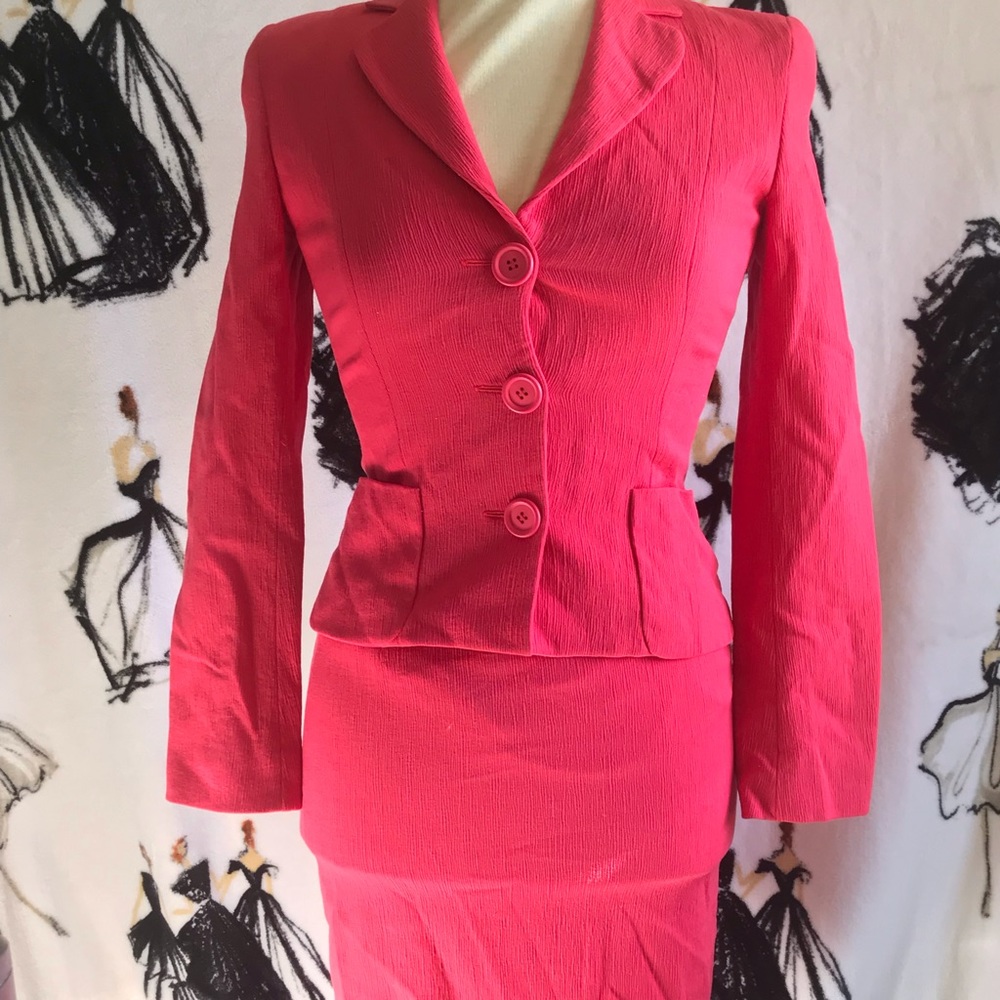 Coral pink suit!